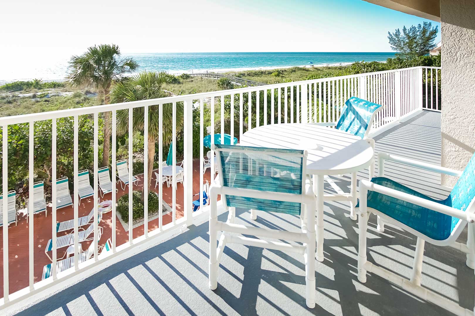 An expansive balcony with an ocean view at VRI's Sand Pebble Resort in Treasure Island, Florida.